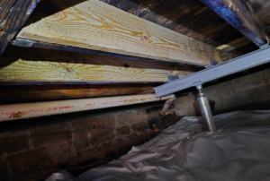 Finished crawl space dig out with full vapor barrier coverage and clean access
