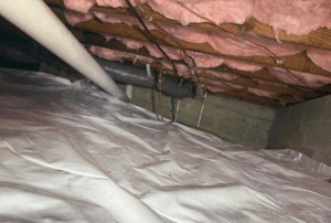 Partial crawl space encapsulation and pink insulation, a step in preventing wood damage in crawl space.